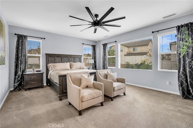 25889 Basil Ct, Corona, CA 92883 - bedroom with baseboards, light carpet, and ceiling fan