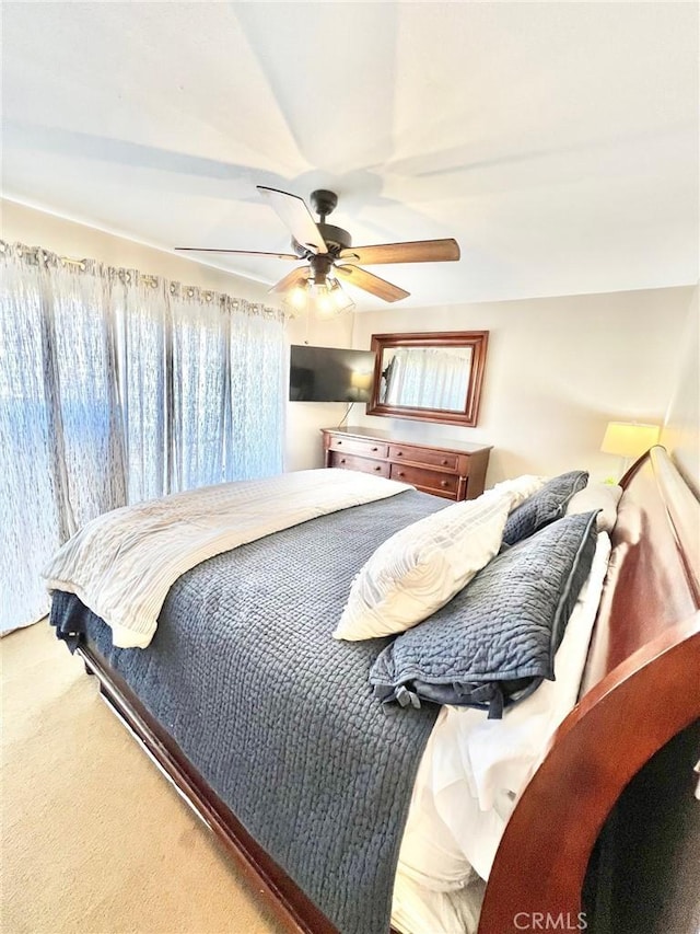 82 Avalon Terrace Rd, Avalon, CA 90704 - carpeted bedroom with ceiling fan and multiple windows
