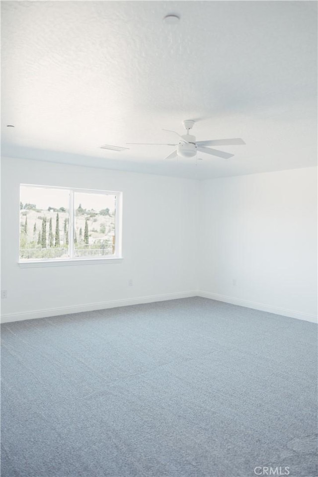 7452 Chase Ave, Hesperia, CA 92345 - carpeted spare room featuring ceiling fan and baseboards
