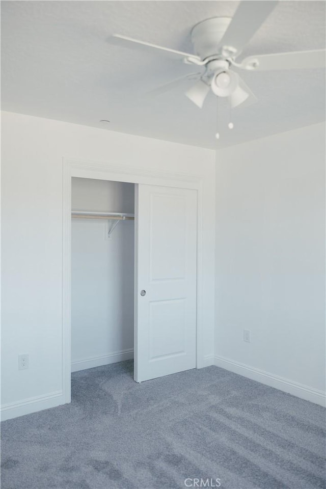 7452 Chase Ave, Hesperia, CA 92345 - unfurnished bedroom with carpet flooring, a closet, baseboards, and ceiling fan