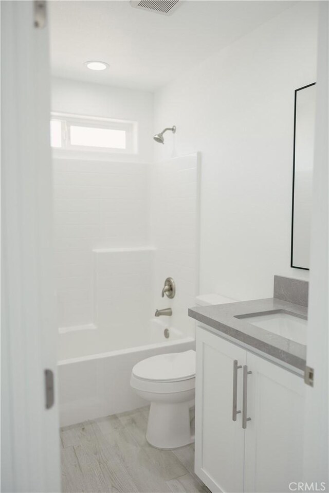 7452 Chase Ave, Hesperia, CA 92345 - bathroom with vanity, toilet, and shower / bath combination