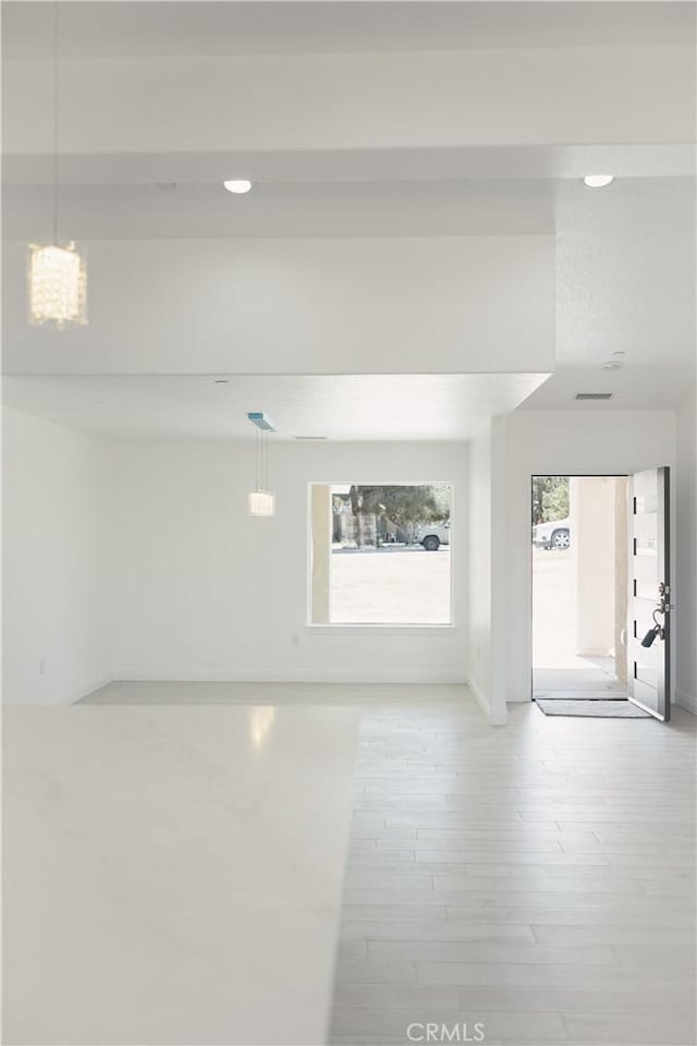 7452 Chase Ave, Hesperia, CA 92345 - spare room with recessed lighting, light wood-type flooring, and baseboards