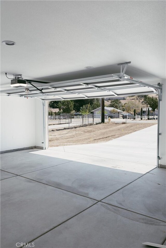 7452 Chase Ave, Hesperia, CA 92345 - garage with a garage door opener