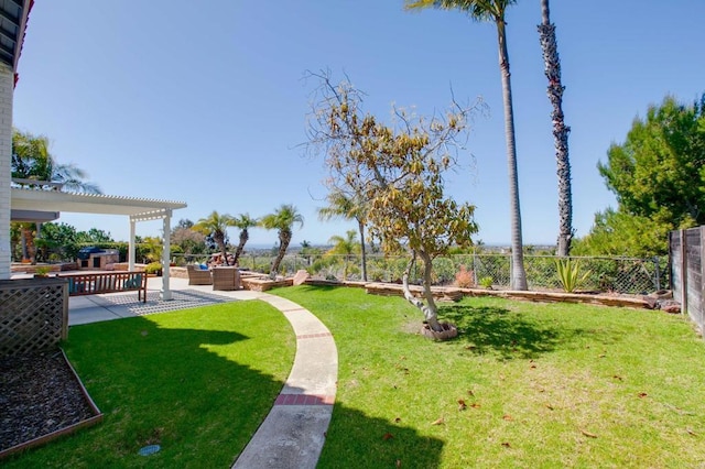 view of yard with an outdoor living space, a fenced backyard, and a patio