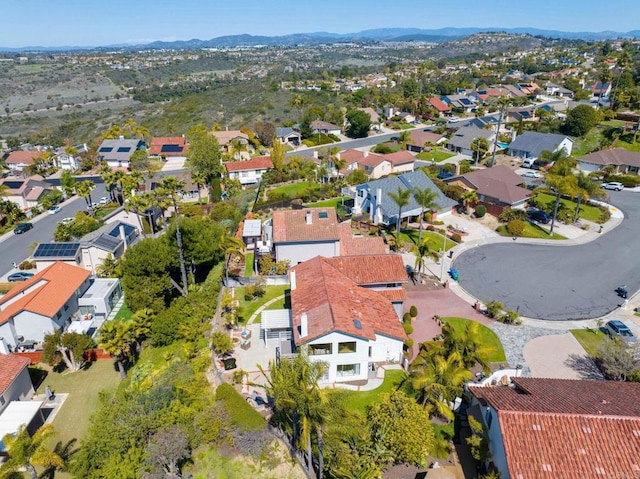 aerial view with a residential view and a mountain view