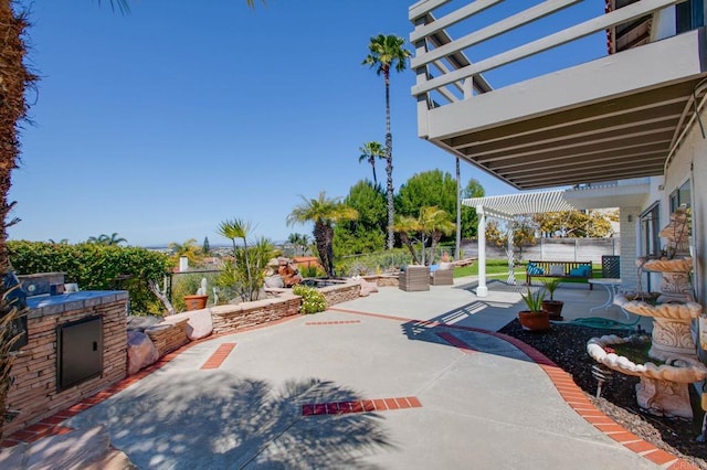 view of patio / terrace with a pergola and a fenced backyard