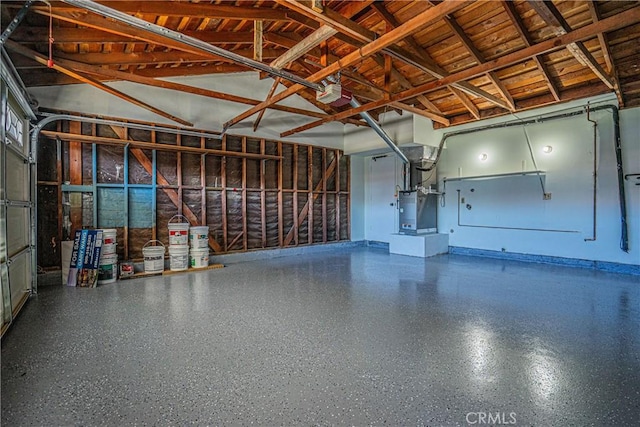 garage featuring heating unit