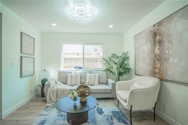 sitting room featuring recessed lighting, wood finished floors, and baseboards
