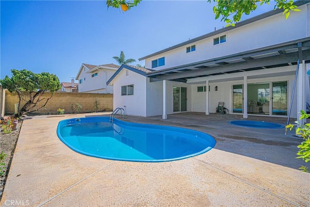 view of pool with a patio area, a fenced backyard, and a fenced in pool