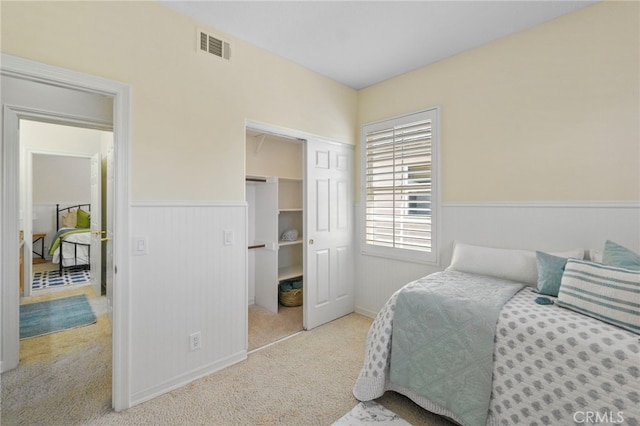 20904 Parkside, Lake Forest, CA 92630 - carpeted bedroom featuring a wainscoted wall and a closet