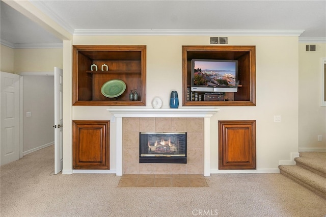 20904 Parkside, Lake Forest, CA 92630 - living area featuring carpet floors, a tile fireplace, crown molding, baseboards, and stairway