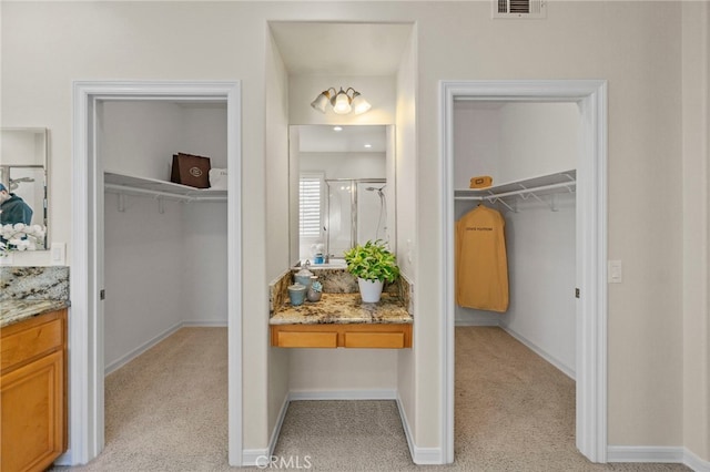 20904 Parkside, Lake Forest, CA 92630 - full bath featuring vanity, a spacious closet, a shower with door, and baseboards