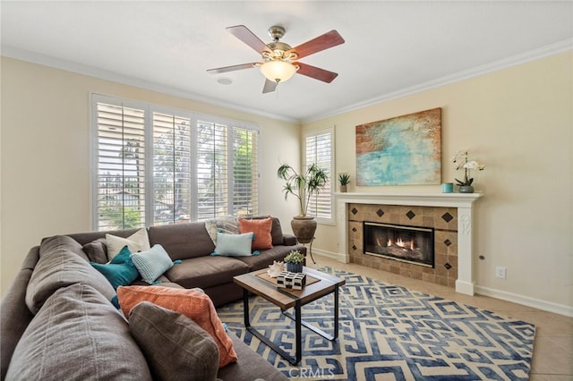 20904 Parkside, Lake Forest, CA 92630 - tiled living area with ornamental molding, a ceiling fan, a tile fireplace, and baseboards
