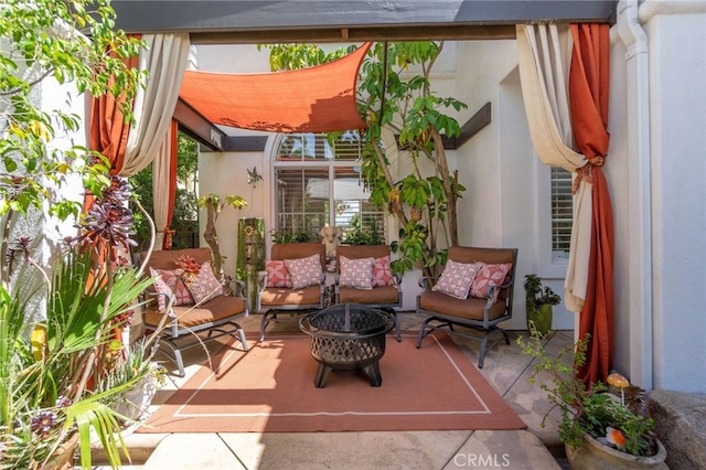 20904 Parkside, Lake Forest, CA 92630 - view of patio / terrace with an outdoor living space with a fire pit