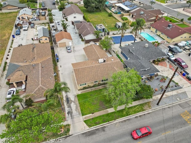 9614 Cypress Ave, Fontana, CA 92335 - aerial perspective of suburban area featuring a pool area