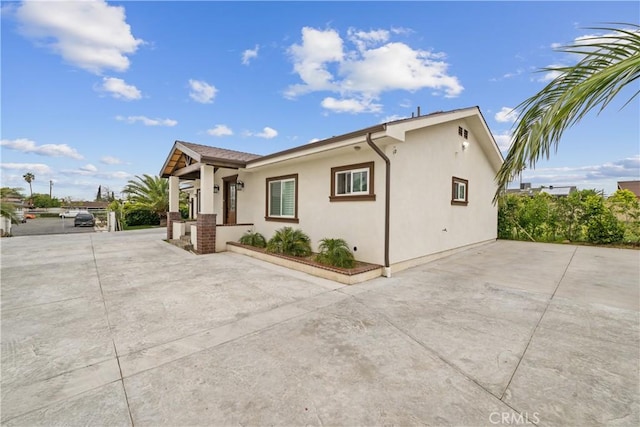 9614 Cypress Ave, Fontana, CA 92335 - view of home's exterior with stucco siding