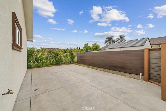 9614 Cypress Ave, Fontana, CA 92335 - view of patio featuring a fenced backyard