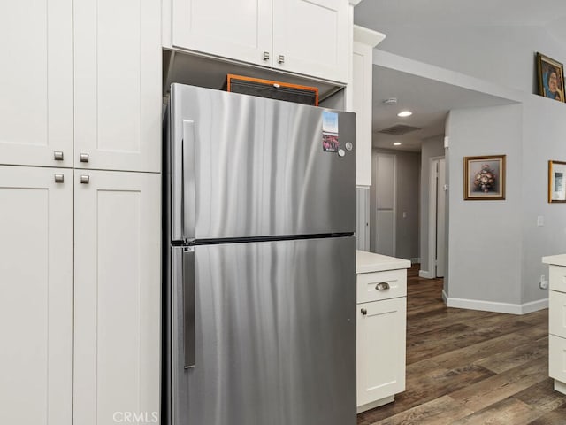 41187 Via Cedro, Murrieta, CA 92562 - kitchen with freestanding refrigerator, light countertops, dark wood-style floors, baseboards, and recessed lighting