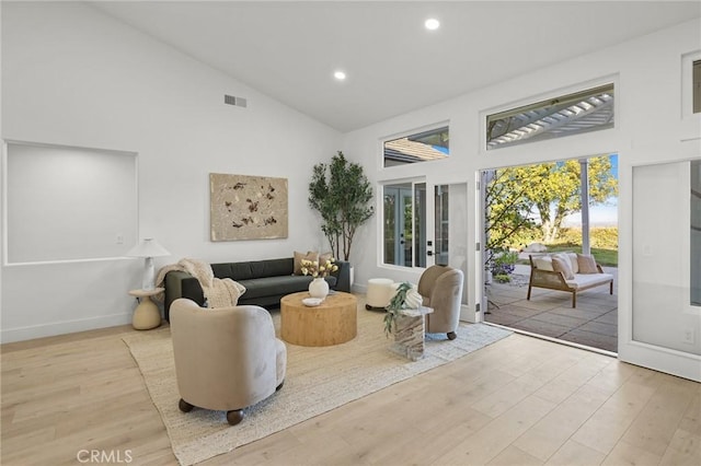 7632 Penobscot Dr, West Hills, CA 91304 - sitting room featuring high vaulted ceiling, wood finished floors, visible vents, and recessed lighting