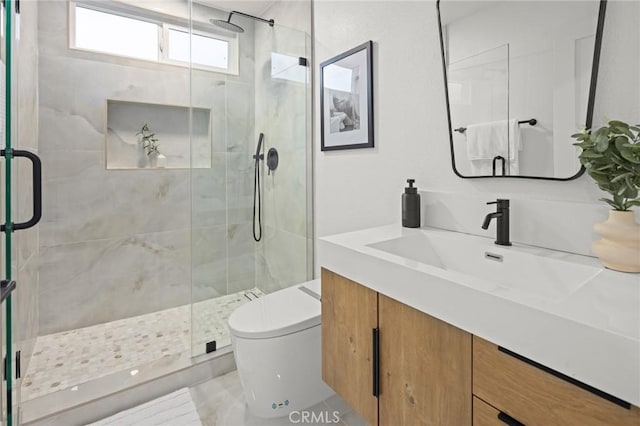 7632 Penobscot Dr, West Hills, CA 91304 - bathroom with toilet, vanity, and a stall shower