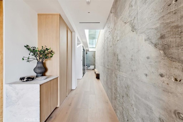 hallway featuring light wood finished floors