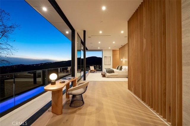 interior space with recessed lighting and wood finished floors