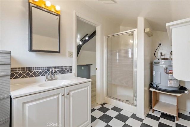 bathroom featuring tile patterned floors, a stall shower, electric water heater, vaulted ceiling, and vanity