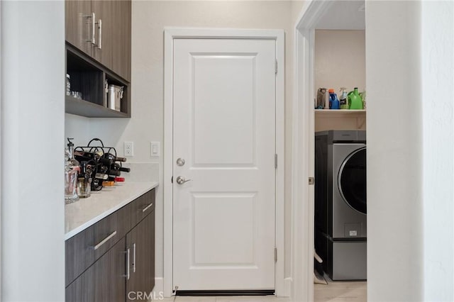 laundry area with laundry area and washer / clothes dryer