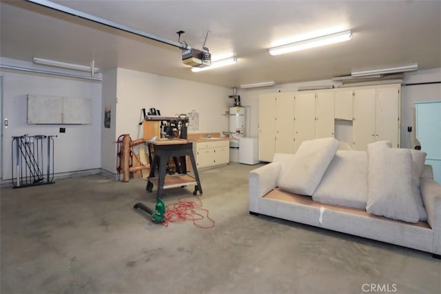 garage featuring secured water heater and a garage door opener