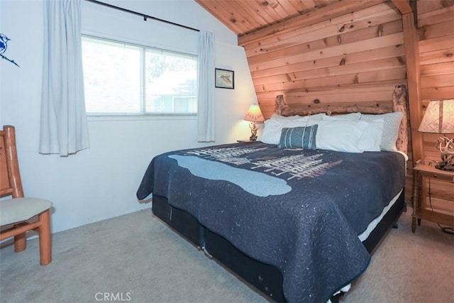 carpeted bedroom featuring wood ceiling, vaulted ceiling, and wood walls