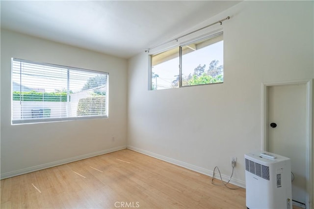2935 Westwood Blvd, West Los Angeles, CA 90064 - spare room featuring baseboards and wood finished floors