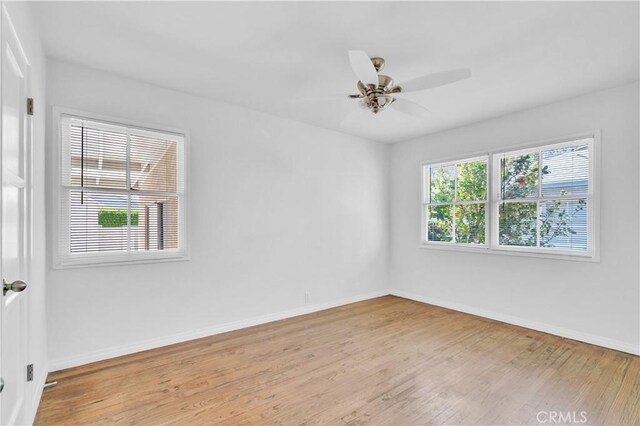 2935 Westwood Blvd, West Los Angeles, CA 90064 - spare room featuring baseboards, a ceiling fan, and light wood-type flooring