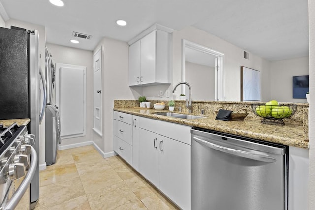 795 Brookstone Unit 201, Chula Vista, CA 91913 - kitchen with stainless steel appliances, a sink, white cabinets, light stone countertops, and recessed lighting