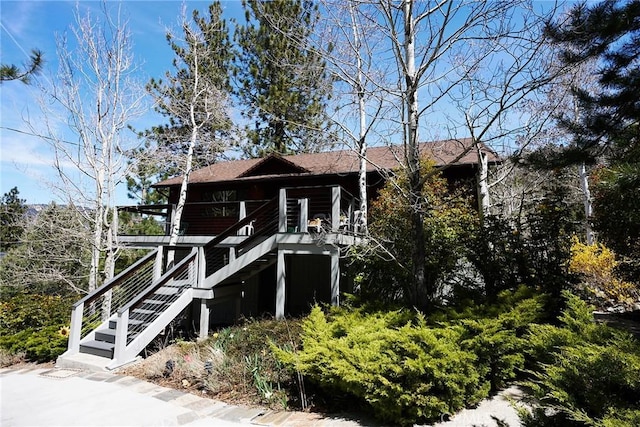 1612 Linden Dr, Pine Mountain Club, CA 93222 - view of front of property featuring stairway and a shingled roof