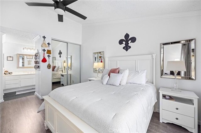 5879 Portsmouth Rd Unit 250, Yorba Linda, CA 92887 - bedroom with crown molding, a textured ceiling, ensuite bathroom, a closet, and dark wood-type flooring
