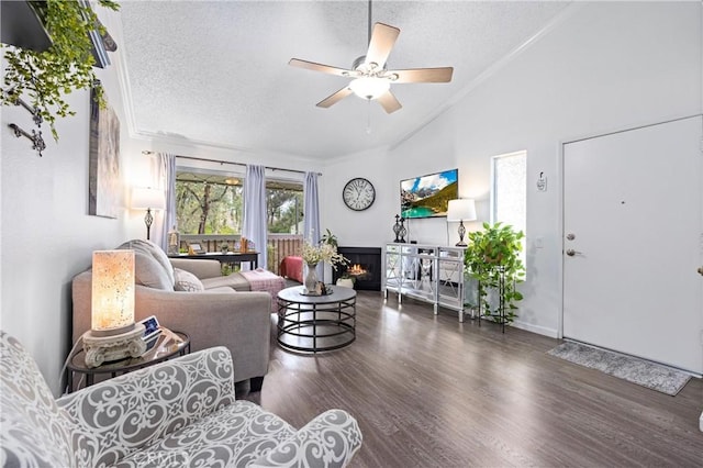 5879 Portsmouth Rd Unit 250, Yorba Linda, CA 92887 - living area with vaulted ceiling, a ceiling fan, wood finished floors, a textured ceiling, and ornamental molding