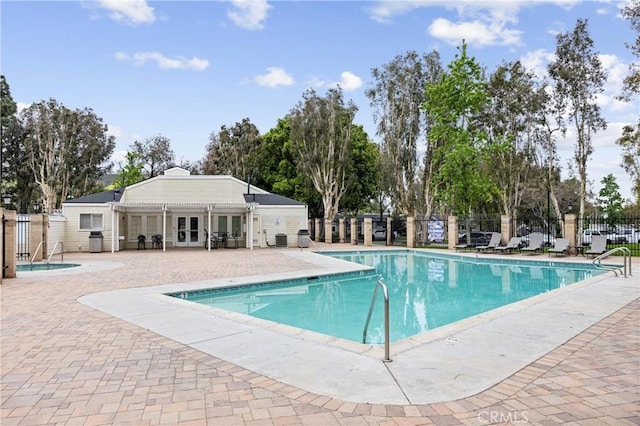 5879 Portsmouth Rd Unit 250, Yorba Linda, CA 92887 - community pool with fence, french doors, and a patio