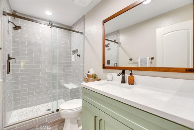 10830 Sundance Dr, Rancho Cucamonga, CA 91730 - full bath with a shower stall, toilet, vanity, and recessed lighting