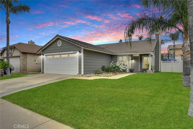 10830 Sundance Dr, Rancho Cucamonga, CA 91730 - ranch-style home featuring a tiled roof, driveway, fence, an attached garage, and a front yard