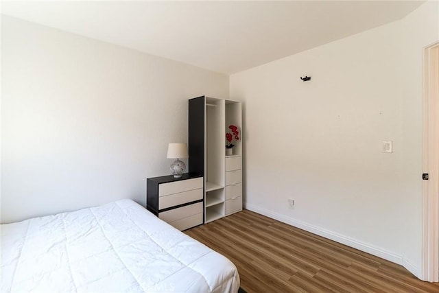 8288 Mercury Dr, Buena Park, CA 90620 - bedroom featuring wood finished floors and baseboards