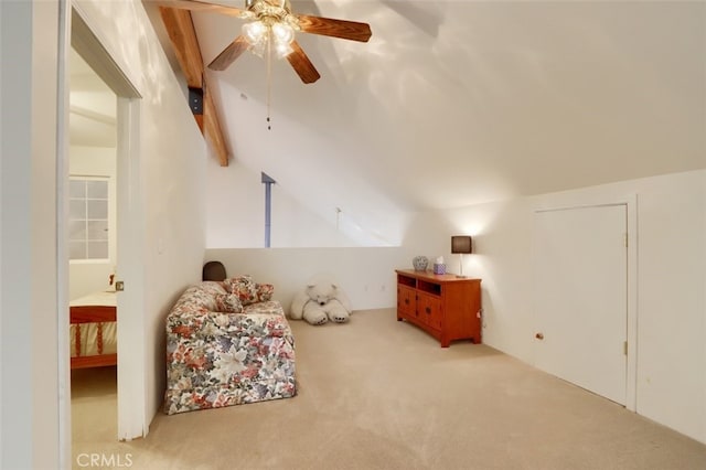 bonus room featuring lofted ceiling with beams, ceiling fan, and carpet