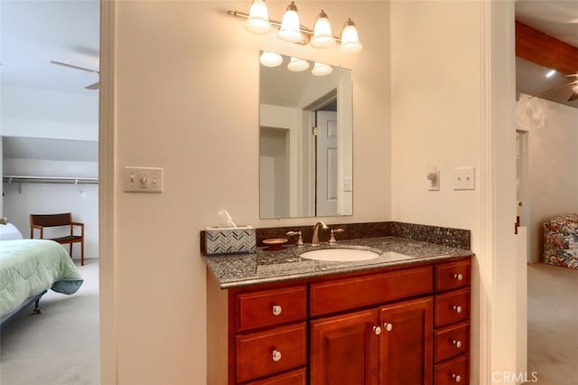 bathroom featuring vanity and connected bathroom