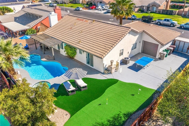 birds eye view of property with a residential view