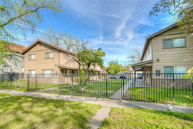 exterior space with a fenced front yard