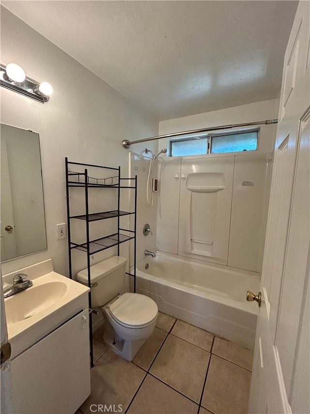 bathroom featuring  shower combination, tile patterned flooring, vanity, and toilet