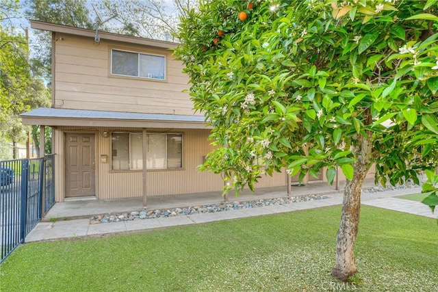 view of front of property with fence