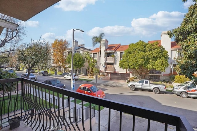 balcony featuring a residential view
