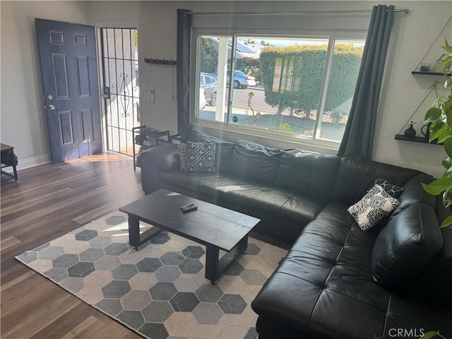 1176 Waxwing Dr, Vista, CA 92083 - living area featuring wood finished floors and baseboards