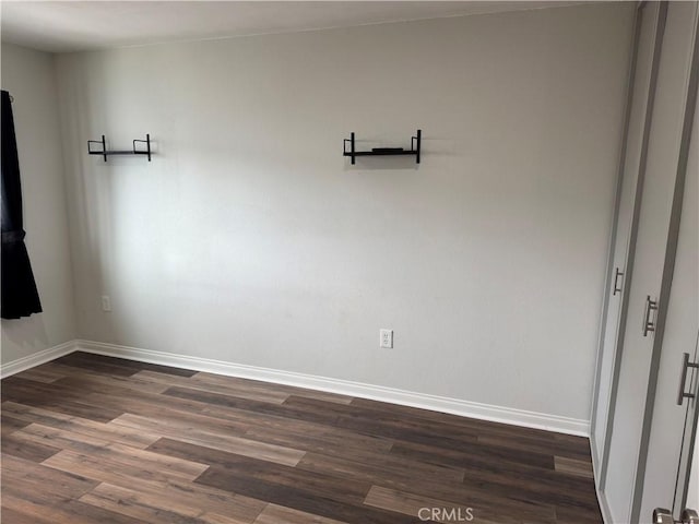 1176 Waxwing Dr, Vista, CA 92083 - unfurnished room with dark wood-style flooring and baseboards