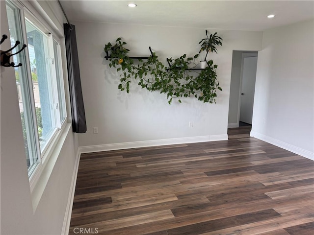 1176 Waxwing Dr, Vista, CA 92083 - unfurnished room with dark wood-type flooring, recessed lighting, and baseboards